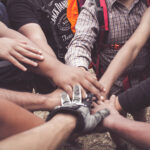 hands reaching in