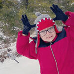 Child playing in snow