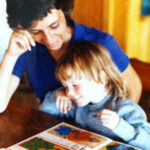 Mom and daughter reading together