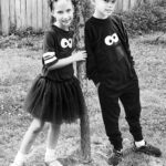 Full length portrait of a little boy and girl.