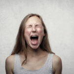 Girl screaming in frustration