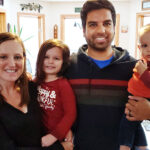 Family portrait in living room