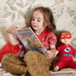 Little boy reading a book