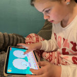 Boy looking at ipad