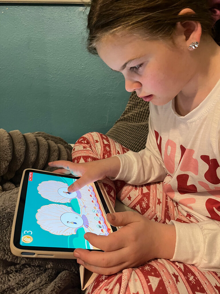 Boy looking at tablet device