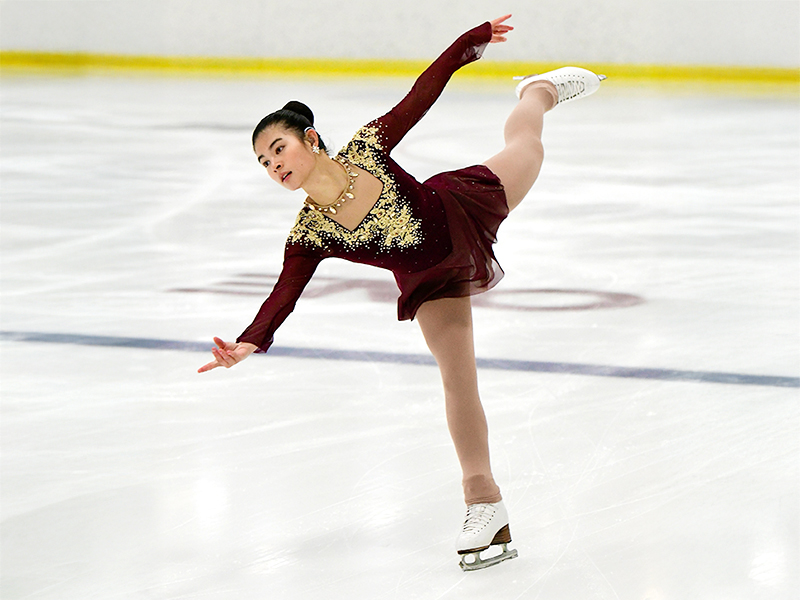 Young girl ice skating