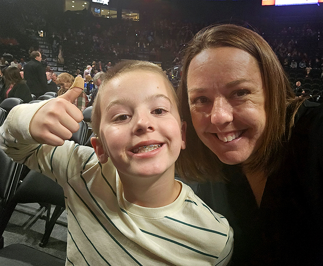 Mom and son - thumbs up